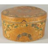 AN INSCRIBED PAPIER MACHE CIRCULAR LIDDED BOX, (af), 20.5cm diameter.