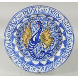 A SPANISH ISLAMIC MARKET BLUE AND WHITE CHARGER, painted with central decorative motif and
