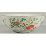 AN EARLY 20TH CENTURT CHINESE FAMILLE ROSE BOWL, painted with flora and precious objects, the