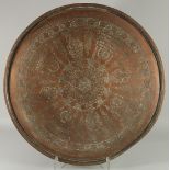 A LARGE 18TH CENTURY OTTOMAN ENGRAVED COPPER TRAY, with Hebrew inscription, 69cm diameter.