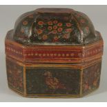A 19TH CENTURY INDIAN LACQUERED PAPIER-MACHE PANDAN BOX, 14cm x 11cm x 11cm.