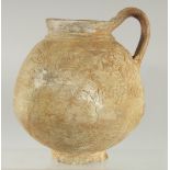 A RARE 11TH-12TH CENTURY PERSIAN SELJUK OR SYRIAN UNGLAZED POTTERY JUG, with raised decoration of