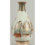 A JAPANESE KUTANI PORCELAIN BOTTLE VASE, painted with figures with fine gilt highlights, the base
