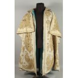 A VERY FINE MOROCCAN GILT METAL THREAD EMBROIDERED COAT, with silk lining, component garment