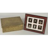A SPANISH BRASS OVERLAID WOODEN BOX, together with a six framed silver badges, (2).