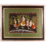 A LARGE FRAMED ISLAMIC / INDIAN PAINTING ON TEXTILE, depicting a blue skin god mid parade or