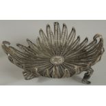 A TURKISH WHITE METAL FILIGREE BASKET, with central tughra, basket raised on four curving feet, 23.