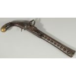 AN OTTOMAN SILVER INLAID FLINTLOCK PISTOL, 43cm.