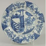 A LARGE CHINESE BLUE AND WHITE PORCELAIN CHARGER, decorated with scenes of various figures including