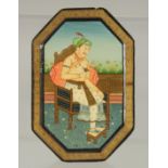 AN INDIAN LACQUERED BOX, the lid with a painting of a seated figure, 11cm x 7.5cm.