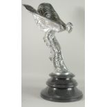 A LARGE SILVERED ROLLS ROYCE FIGURE, spirit of ecstasy, on a circular base.