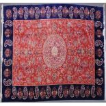 A VERY GOOD ISLAMIC CARPET, 20TH CENTURY, salmon pink with a rich blue border, having an allover