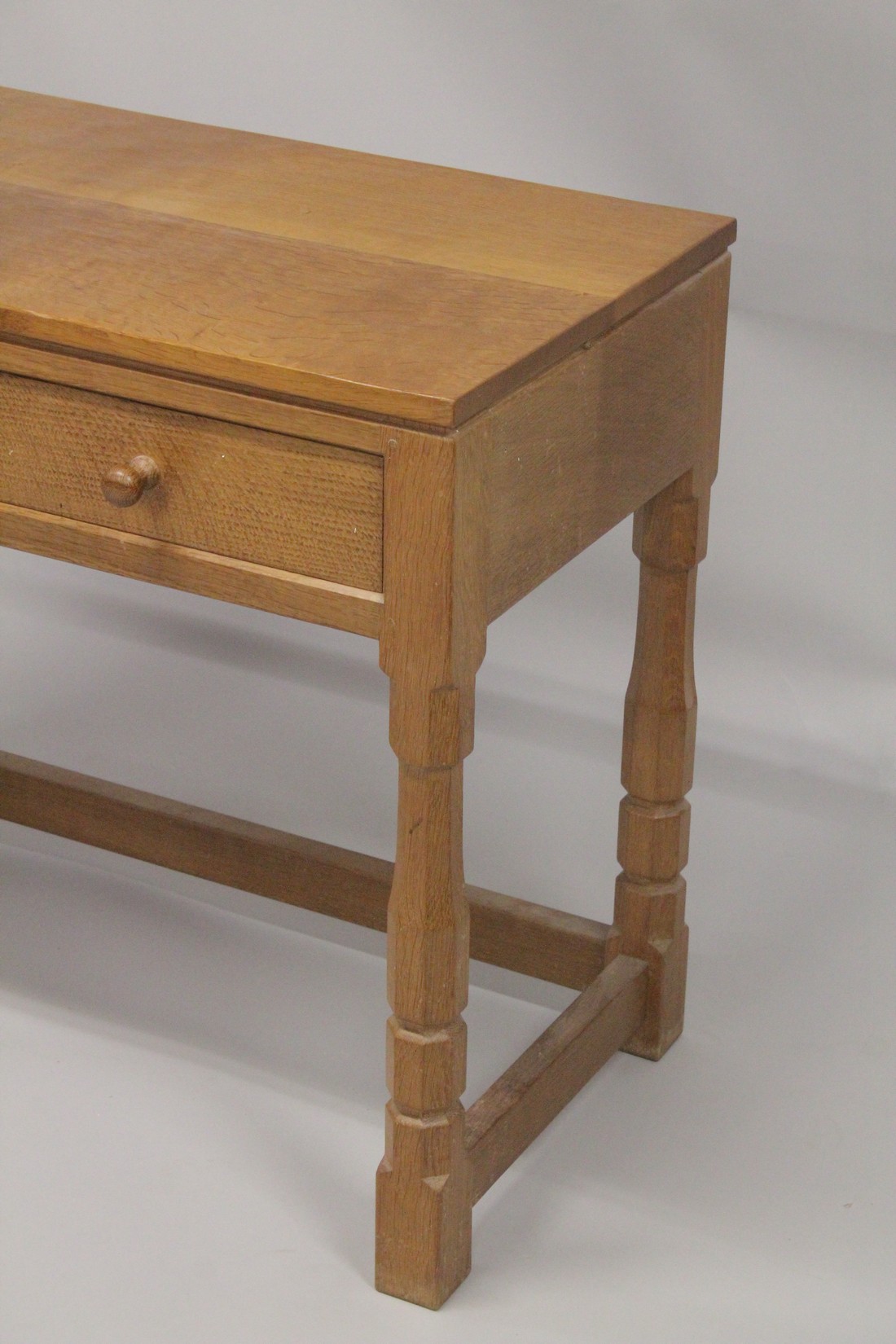 ROBERT "MOUSEMAN" THOMPSON. AN OAK SIDE TABLE with an adzed rectangular top, two frieze drawers with - Image 4 of 5
