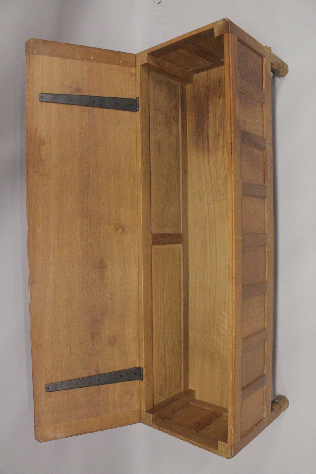 ROBERT "MOUSEMAN" THOMPSON. AN OAK OTTOMAN, with an adzed rectangular rising top, panelled front and - Image 3 of 6