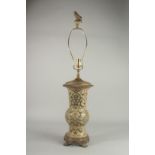 A GOOD GREEN PORCELAIN LAMP VASE on a bronze stand. Vase: 16ins.