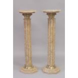 A GOOD PAIR OF BEIGE MARBLE COLUMNS with octagonal tops. 3ft 4ins high.