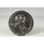 A BRONZE CIRCULAR PLAQUE "THE RIGHT HON. JOHN BRIGHT M. P" 8.5ins diameter.