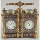 A DOUBLE CLOISONNE CLOCK AND BAROMETER with carrying handle.