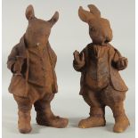 A PAIR OF CAST IRON BEATRIX POTTER FIGURES. 17ins high.