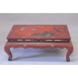 A CHINESE RED LACQUERED RECTANGULAR TOP TABLE on four curving legs. 3ft 4ins long, 2ft wide.