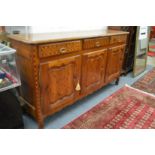 A GOOD 19TH CENTURY FRENCH FRUITWOOD SIDEBOARD with three frieze drawers above three panelled