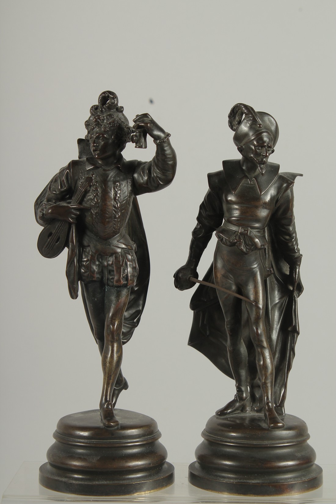 AUGUSTE LOUIS LALOUETTE (1826 - 1883) FRENCH. A PAIR OF BRONZE CAVILER FIGURES on circular bases 8.