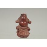 A STANDING FROG CARVED WOOD NETSUKE. Signed.