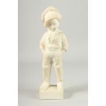 A GOOD MARBLE FIGURE OF A DUTCH BOY smoking a pipe, on a square base. 14ins high.