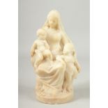 A GOOD 18TH - 19TH CENTURY CARVED MARBLE FAMILY GROUP mother and two children on a circular base.