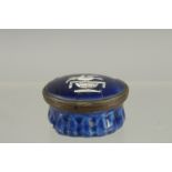 A BILSTON BLUE ENAMEL PATCH BOX "A PLEDGE OF LOVE a mirror in the lid. 1.5ins x 1.25in.