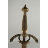 A GERMAN SWORD in a leather scabbard with brass handle. Inventory No. 10.1257. 40ins long.