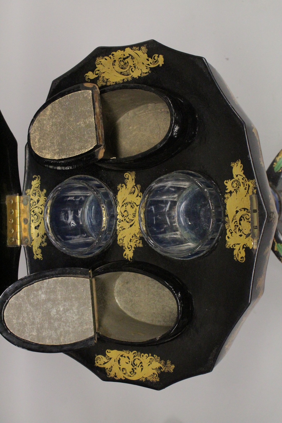 A VICTORIAN PAPIER MACHE TEA POUY ON A TRIPOD BASE, inlaid with mother of pearl and decorated in - Image 4 of 7