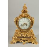A GOOD 19TH CENTURY FRENCH ORMOLU ROCOCO CLOCK with circular dial by Suisse Freres, Paris.