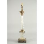 A CORINTHIAN COLUMN GLASS AND ORMOLU LAMP on a marble base. 25ins high.