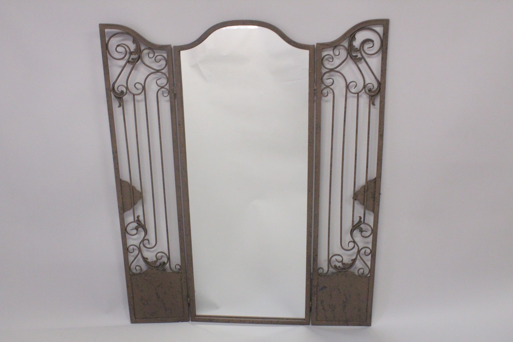 AN IRON GATE with opening doors and mirror. 4ft 2ins high.