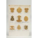 A collection of nine Danish army badges.