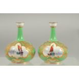 A PAIR OF ROYAL CROWN DERBY VASES painted with sailing vessels by W.E.J. DEAN. Initialled.