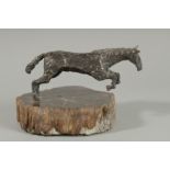 A GOOD CAST SILVER MODEL OF A LEAPING HORSE on an onyx base. 8ins long. London 1981.