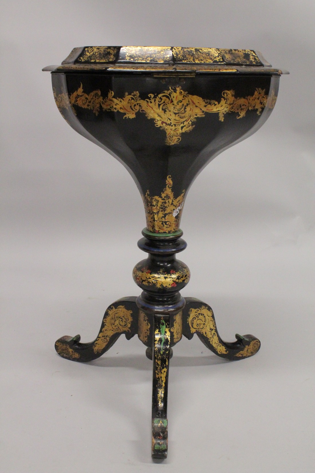 A VICTORIAN PAPIER MACHE TEA POUY ON A TRIPOD BASE, inlaid with mother of pearl and decorated in - Image 7 of 7