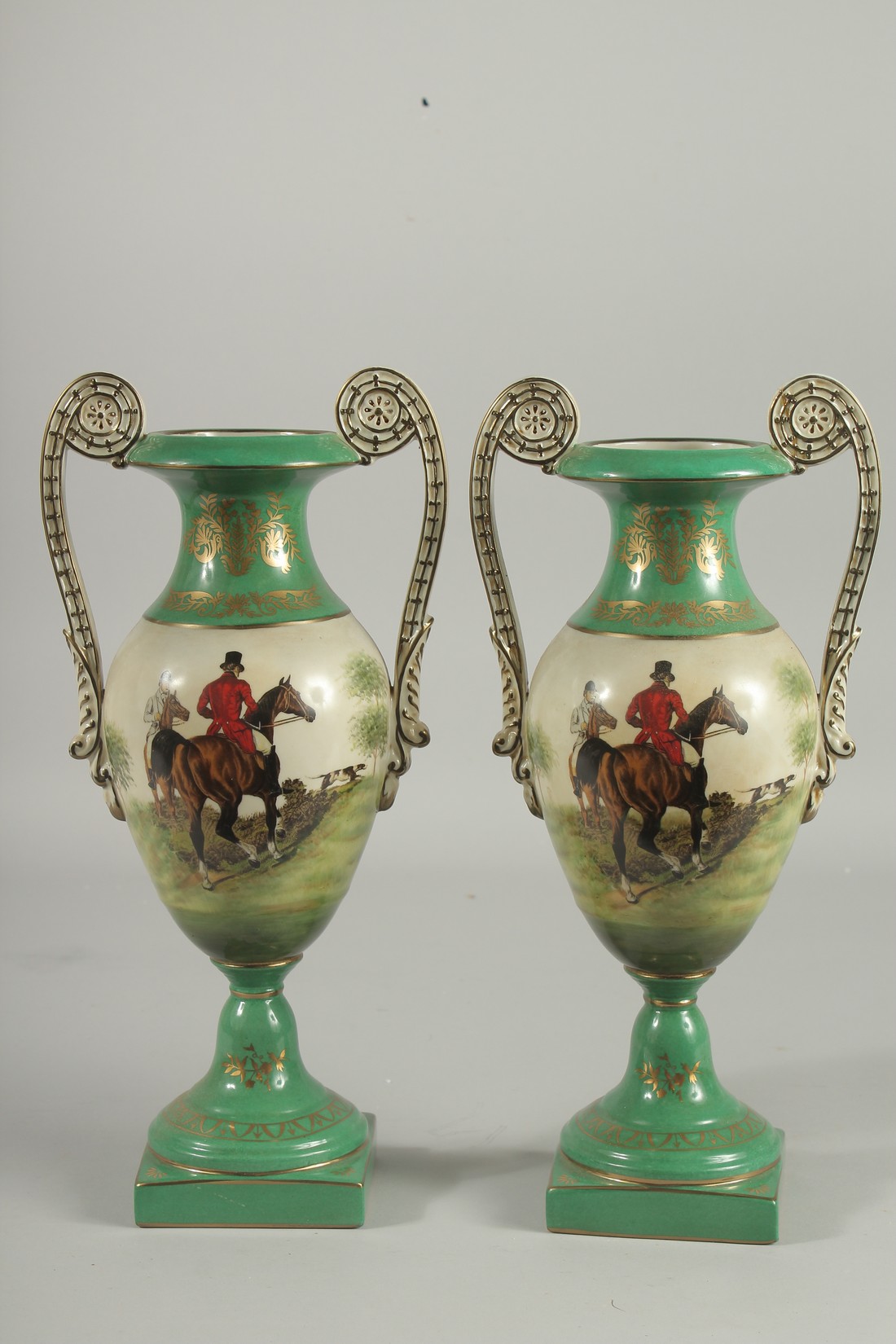A PAIR OF SEVRES DESIGN TWO HANDLED GREEN HUNTING VASES. 13ins high. - Image 3 of 3