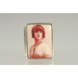 A STERLING SILVER PILL BOX the lid with a young lady. 1.25ins x 1in.