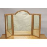 ROBERT "MOUSEMAN" THOMPSON. AN OAK TRIPLE PANEL FOLDING DRESSING TABLE MIRROR with arched central