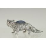 A NOVELTY SILVER FOX PIN CUSHION. 2.25ins long.