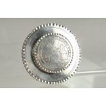 A CONTINENTAL SILVER CIRCULAR BOX engraved NEC ME VIS DNIDET VELA. 3.25ins diameter.