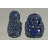 TWO CHINESE CARVED LAPIS PENDANTS.