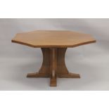 ROBERT "MOUSEMAN" THOMPSON. AN OAK OCTANGONAL DINING TABLE with a adzed concave sided top, supported