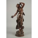 AUG MOREAU A GOOD BRONZE OF A YOUNG LADY with flowing hair. Signed on a circular base. 24ins high.