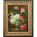Thomas Lee (20th Century) A still life of mixed flowers in an urn, oil on canvas, signed, 16" x 12",