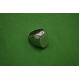 A stainless steel signet ring, size O/P.