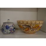 A Charlotte Rhead decorated pottery bowl together with a Poole pottery preserve jar.